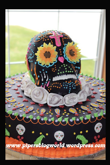 I baked and decorated a sugar skull cake for the party.